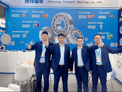 Industrial gearbox manufacturer team at international trade exhibition showcasing reducer gearbox products